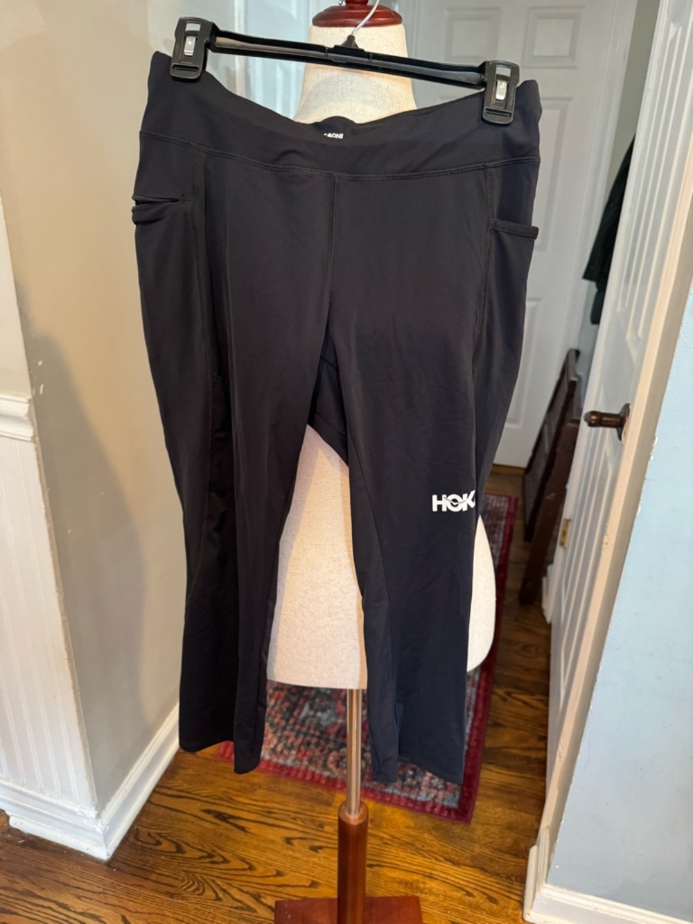 2 pairs of Hoka One One Women’s Leggings - one large and one x-large